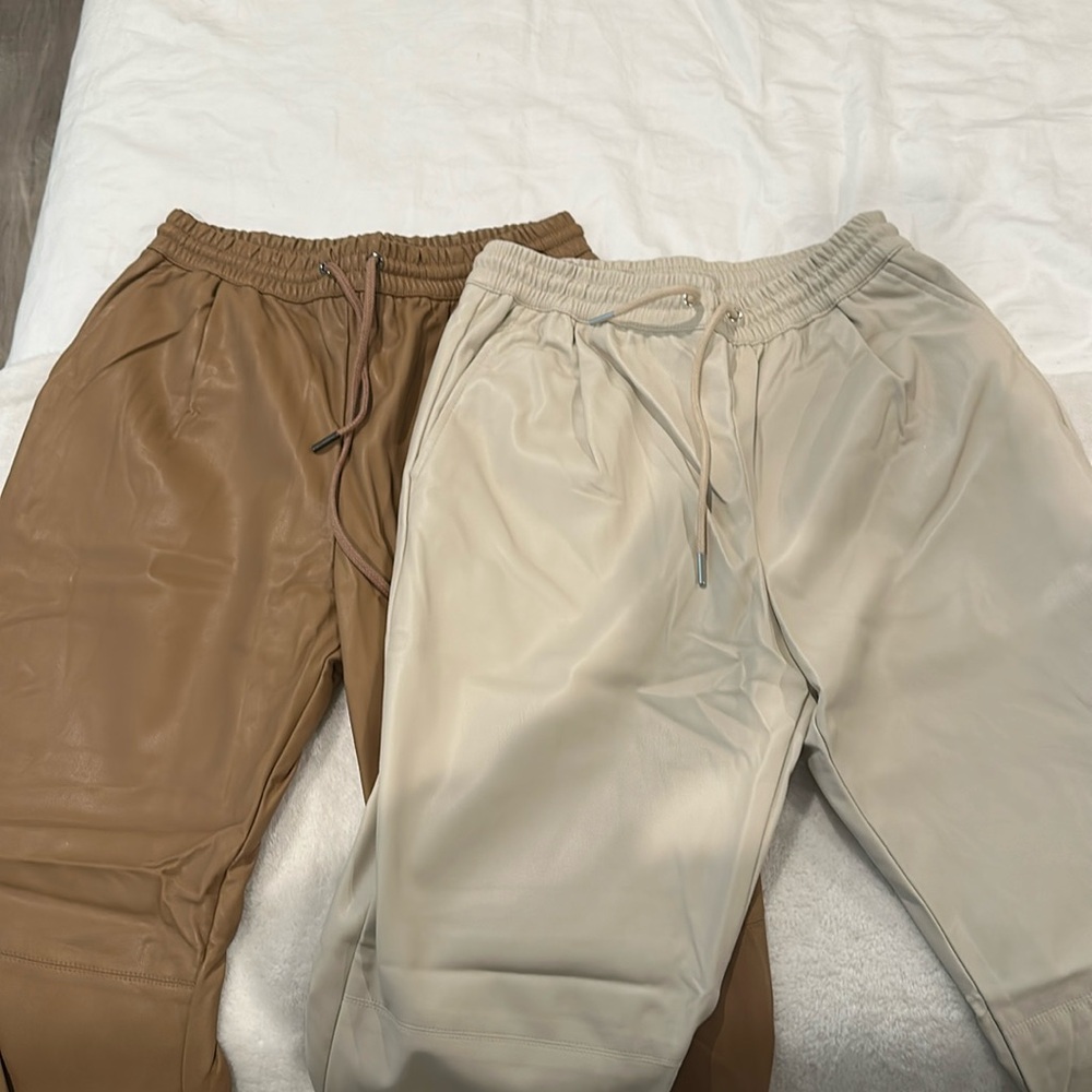 Two pairs of faux leather joggers
